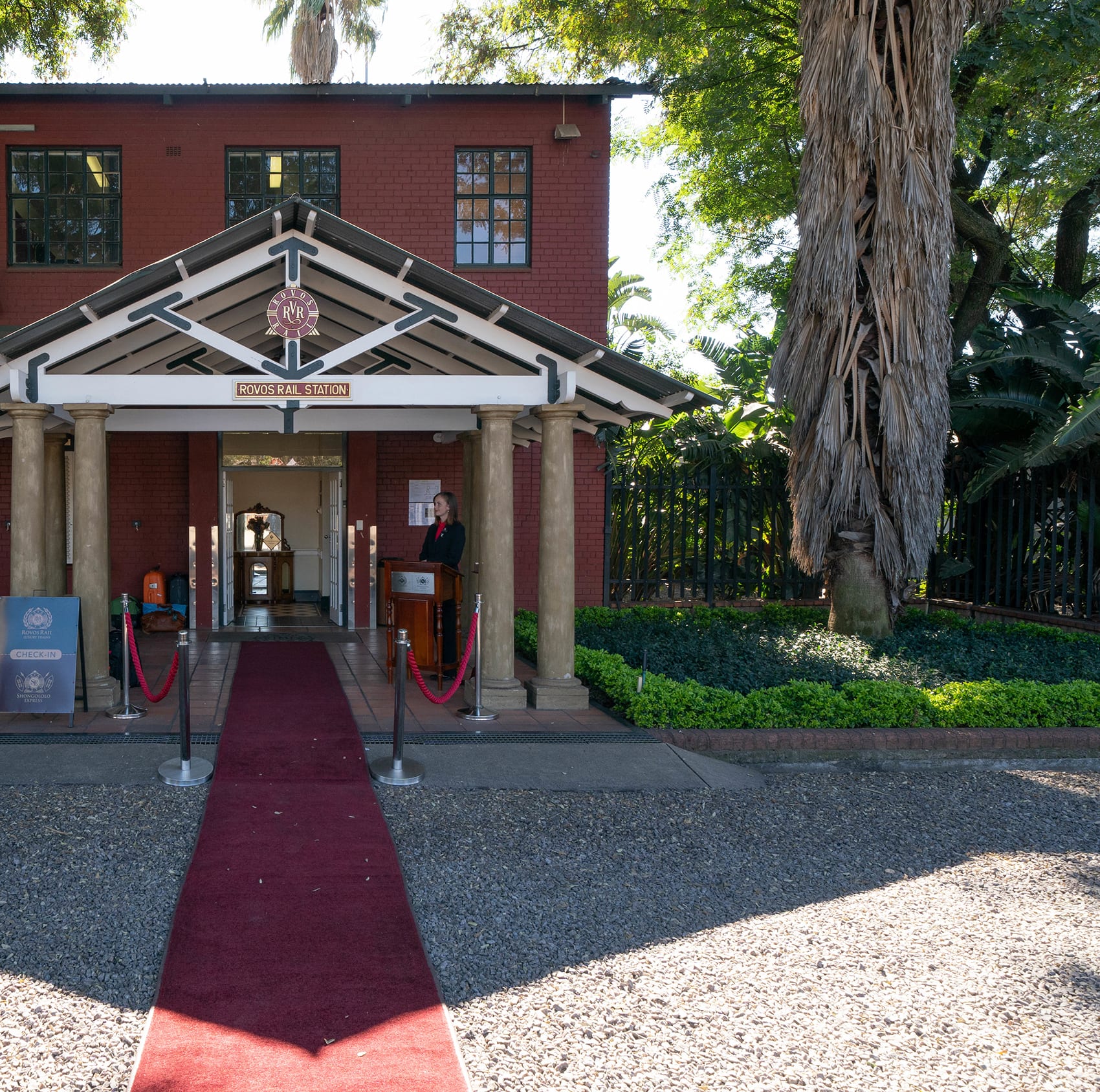 The private Rovos Rail station in Pretoria, with the red carpet leading to check-in for the Pride of Africa.